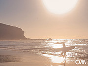 Surfisti al tramonto a La Pared